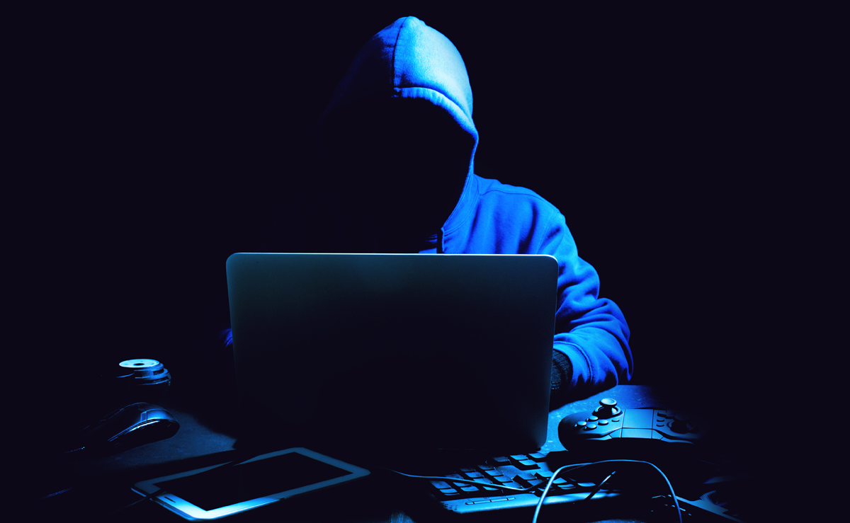 hacker man terrorist with virus computer attack to server network system online in data internet security hacking ai concept. (c) AdobeStock