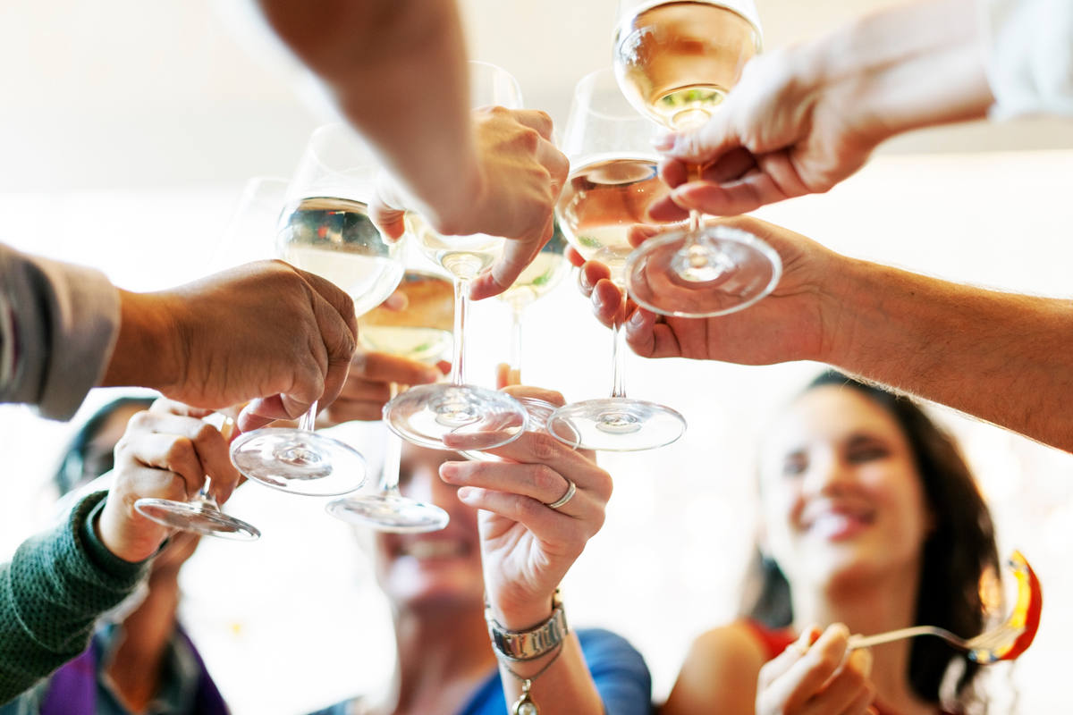 People Cheers Celebration Toast Happiness Togetherness Concept. (c) AdobeStock