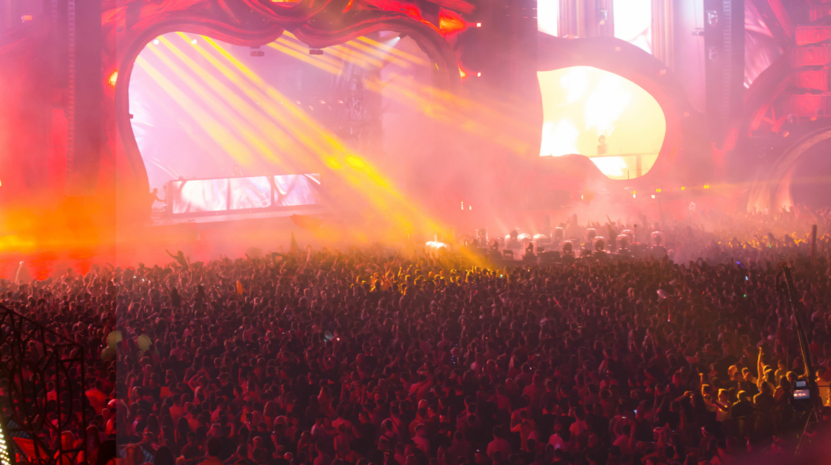 Summer festival concert crowd lights. (c) AdobeStock